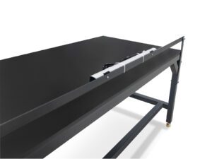 Rear integrated power rail installed on a laboratory workbench for microscopes and computer equipment.