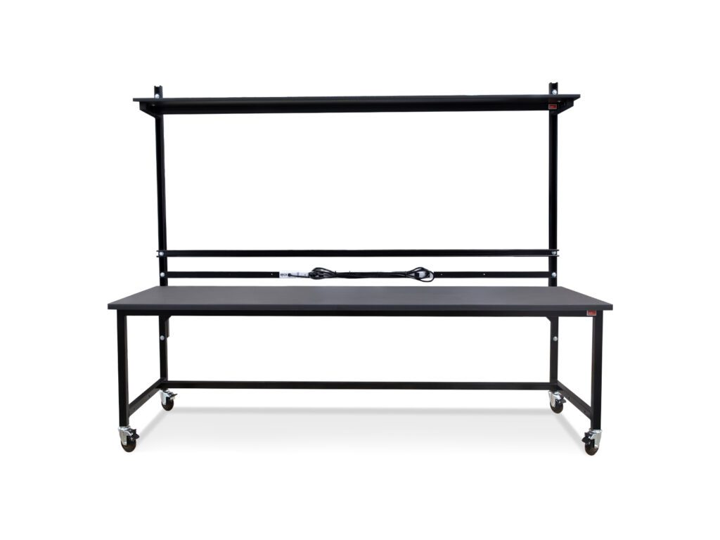 Upper Deck ESD workbench for aviation electronics testing with upper shelf, integrated power rail, and locking casters.